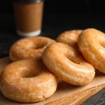 Delicious,Glazed,Donuts,On,Wooden,Board,,Closeup