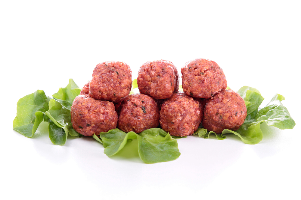 raw meatball on white